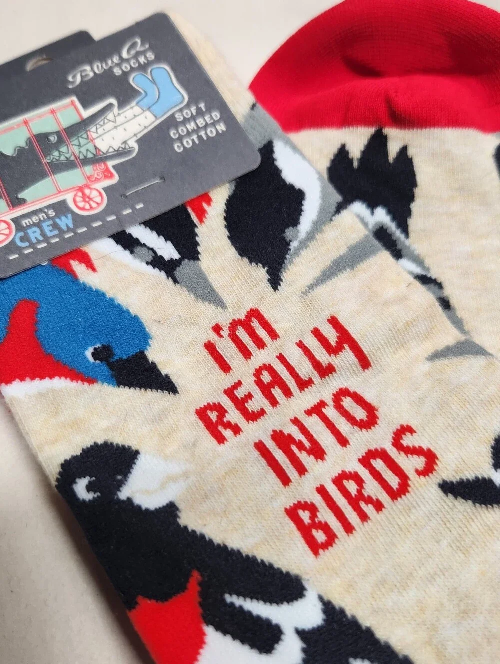 Blue Q Im Really Into Birds Socks with Red Accents and Multicolored Bird Design